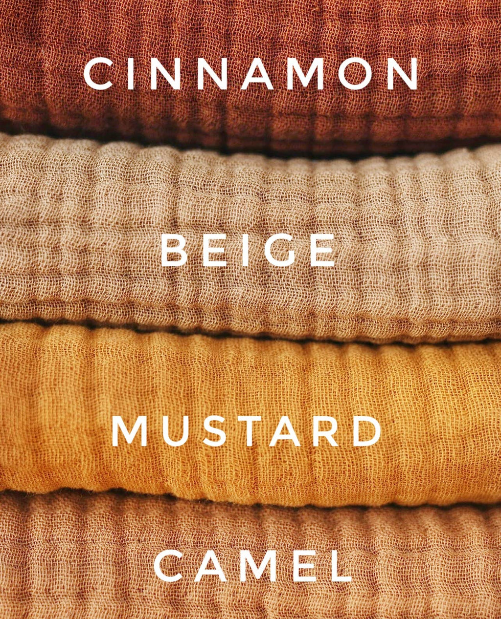 Organic cotton muslin blanket displayed in a home setting, with neutral colors hanging on a coat rack.