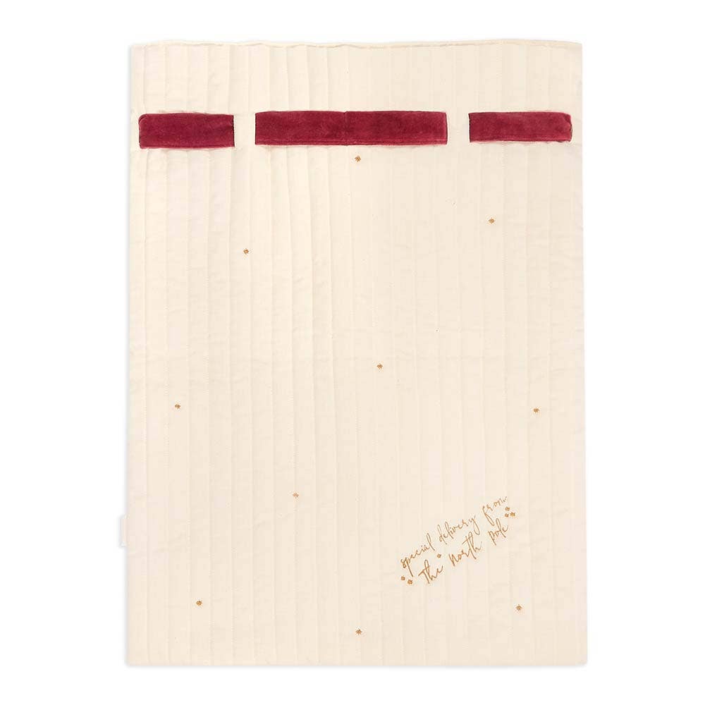 Beige towel with red stripes and text on a white background