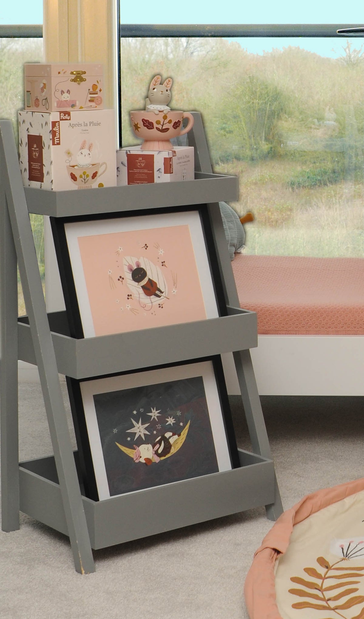 After the Rain musical jewellery box displayed on a nursery shelf alongside framed posters and other Moulin Roty décor