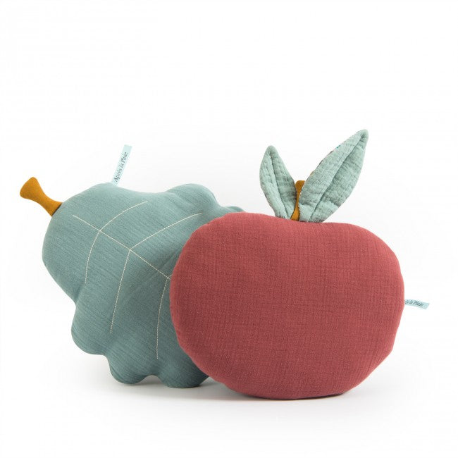 Plum red apple-shaped cushion displayed beside a turquoise oak leaf-shaped cushion on a white background