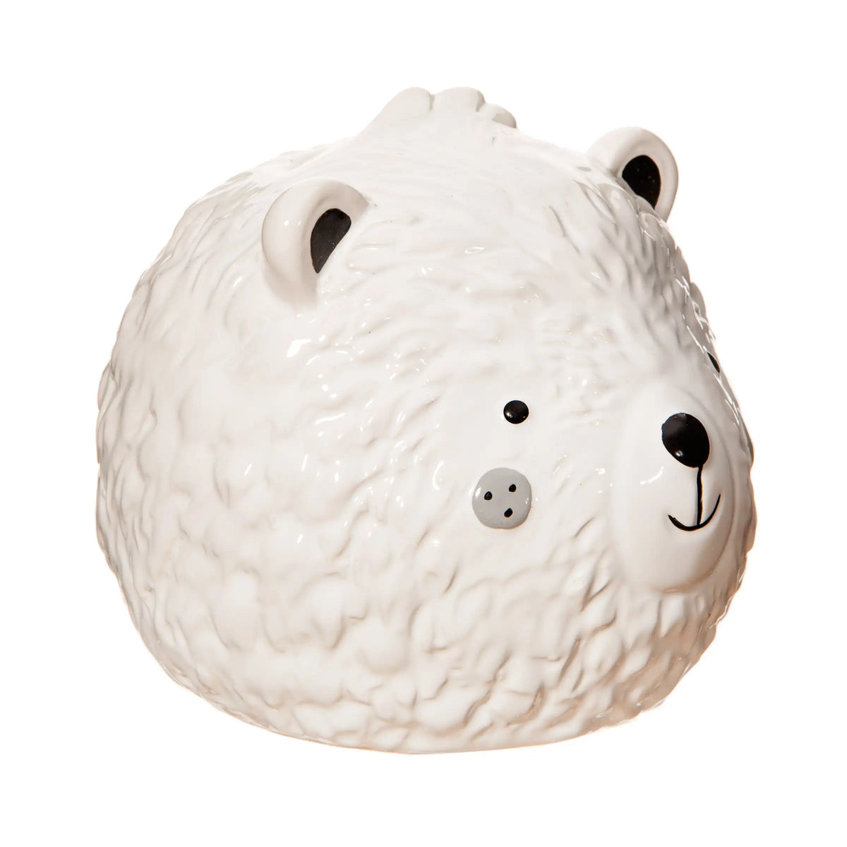 White ceramic bear money box with textured fur and a friendly face viewed from the side