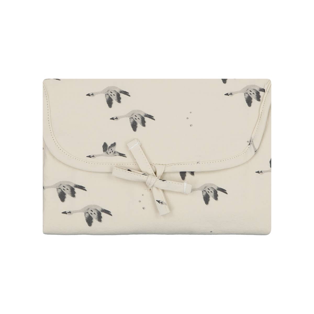 Folded cream Charly Goose changing mat featuring a grey flying goose print, stitched edging and a matching fabric tie closure.