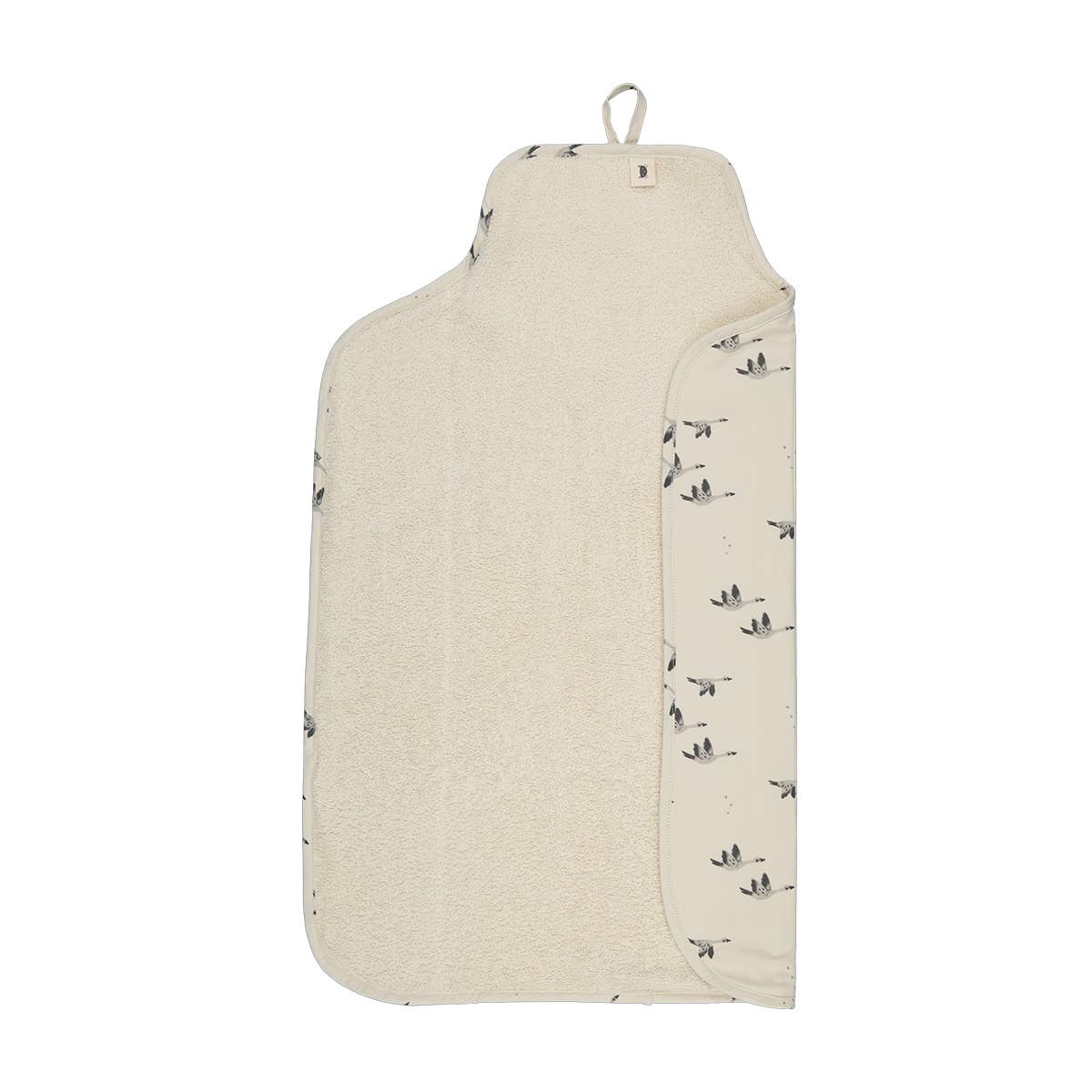 Open Charly Goose changing mat featuring a soft cream terry lining, cream outer fabric with a grey goose print, a side pocket and a hanging loop.