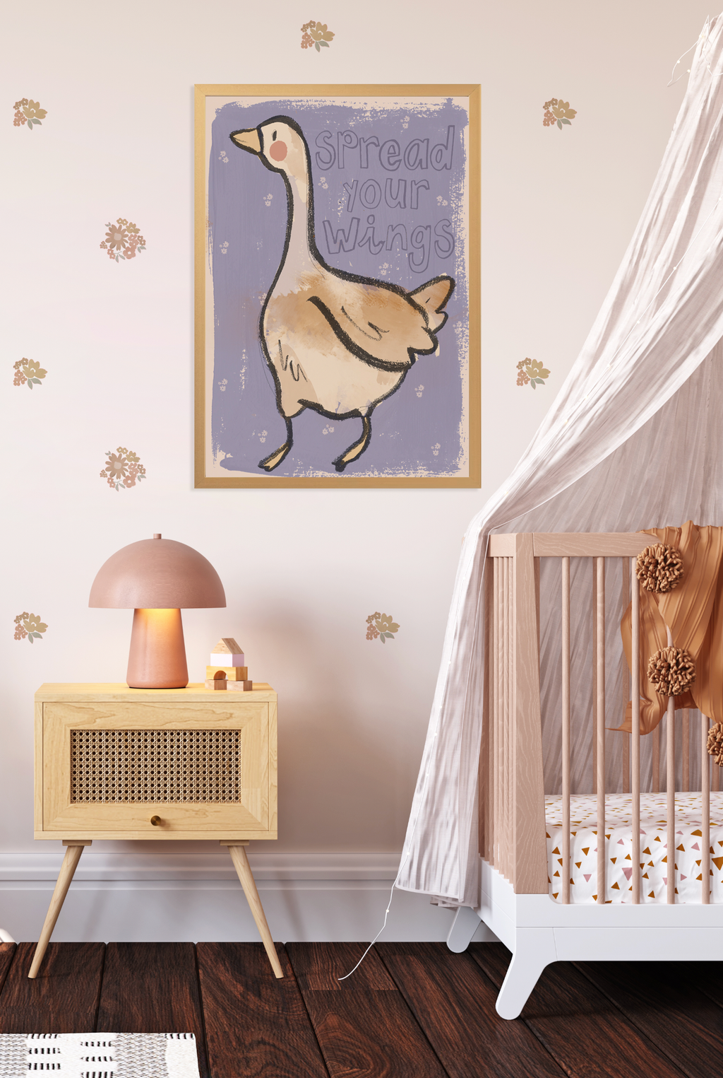 Ditsy floral wall stickers in muted mustard, terracotta and sage green styled around a framed goose print in a neutral nursery with a wooden cot and bedside table.