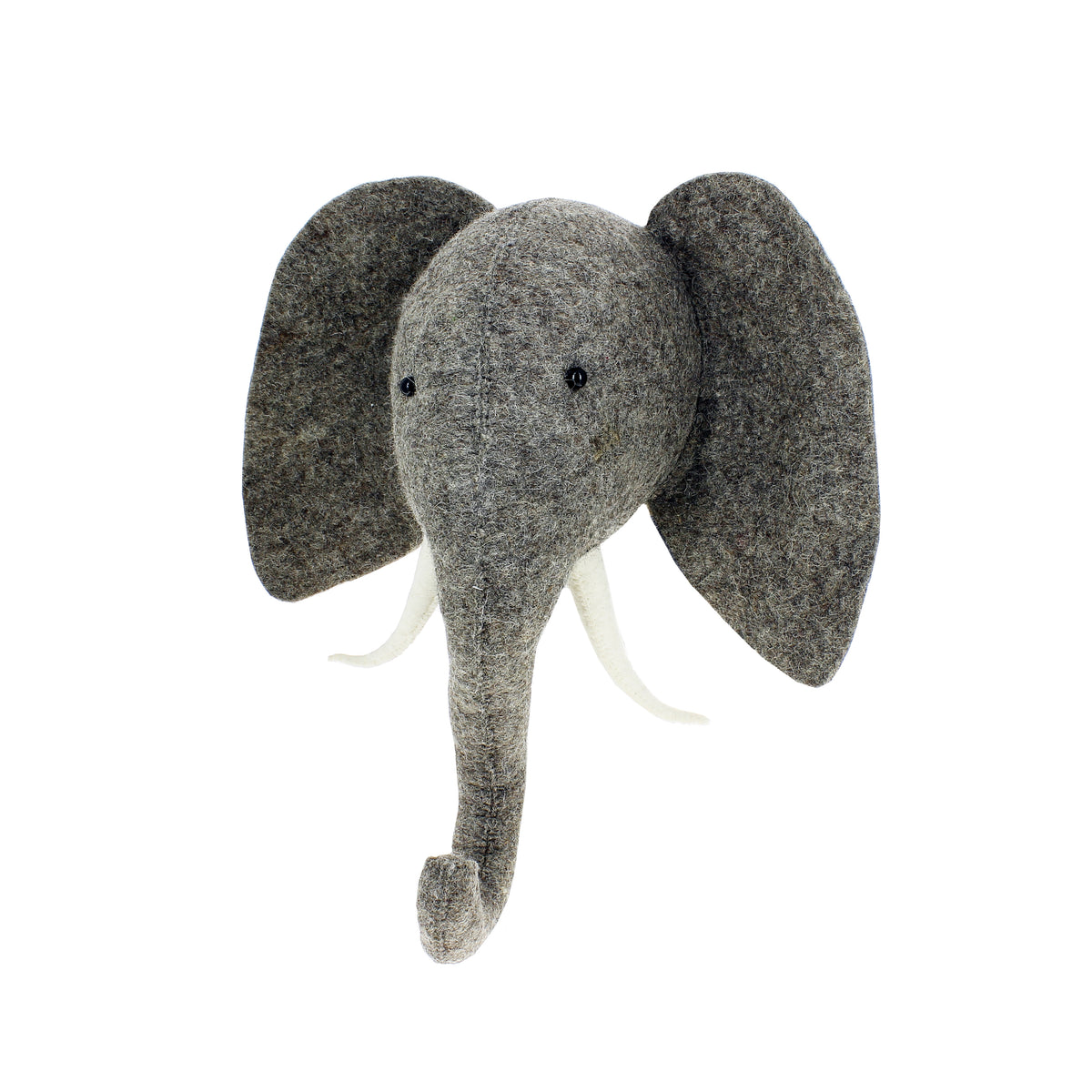 Three-quarter view of the Fiona Walker medium grey elephant head wall décor, featuring textured wool felt, oversized floppy ears, an elongated trunk, small black eyes and curved ivory tusks.