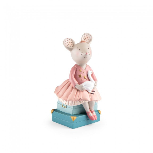 Side view of the Moulin Roty The Little Dance School money box, featuring a mouse in a pink ballerina dress holding a white swan on a teal-blue decorative base.