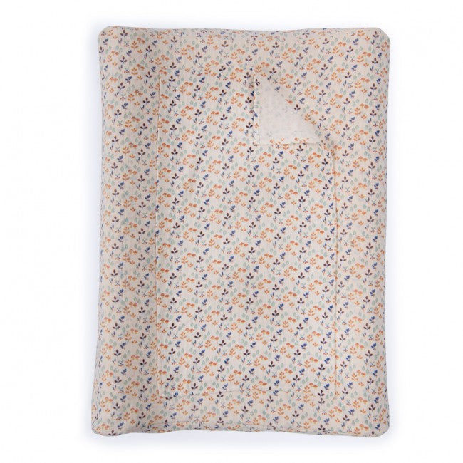 Pomme des Bois baby changing mat with a cream background and a delicate multicoloured floral pattern, shown on a white background