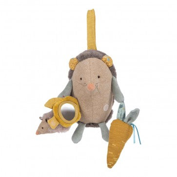 Soft beige activity hedgehog toy with a hanging loop, yellow-framed mirror, small hedgehog companion and mustard carrot.