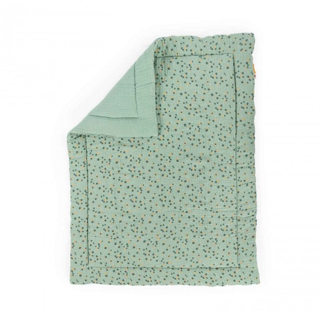 Sage green baby quilt with a delicate botanical pattern, folded to show the plain green reverse and patterned front on a white background