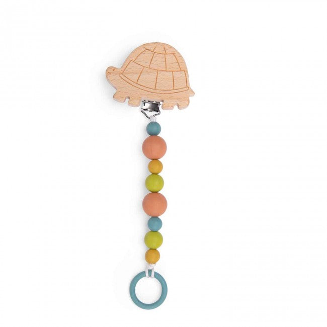 Turtle-shaped wooden soother holder with colourful silicone beads and a blue silicone ring on a white background