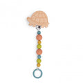 Turtle-shaped wooden soother holder with colourful silicone beads and a blue silicone ring on a white background