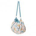 Play & Go Mat by Rockermumma, Sous mon Baobab accessories, featuring colorful fabric with playful patterns for children.